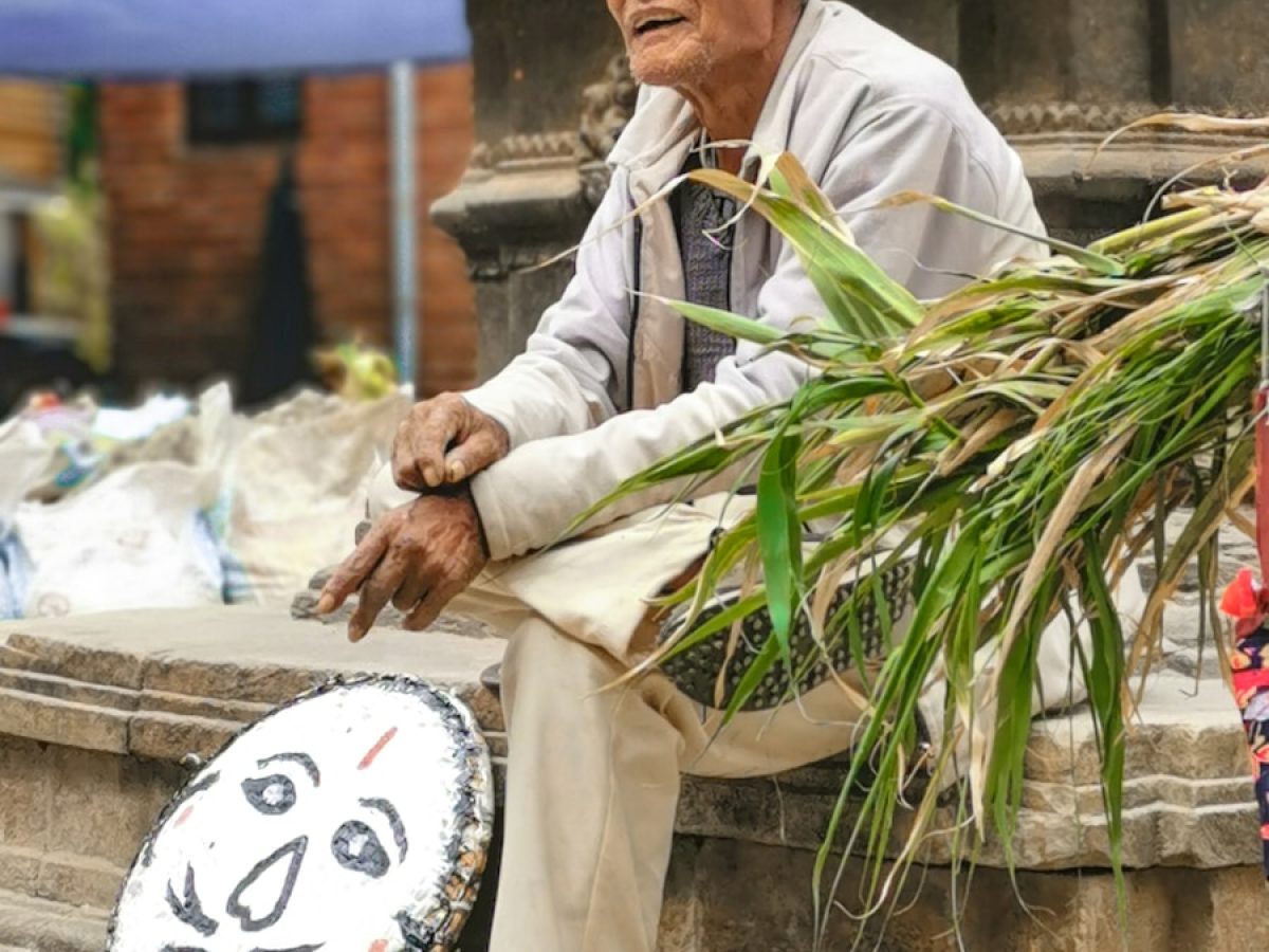 resham firiri man wearing white cardigan